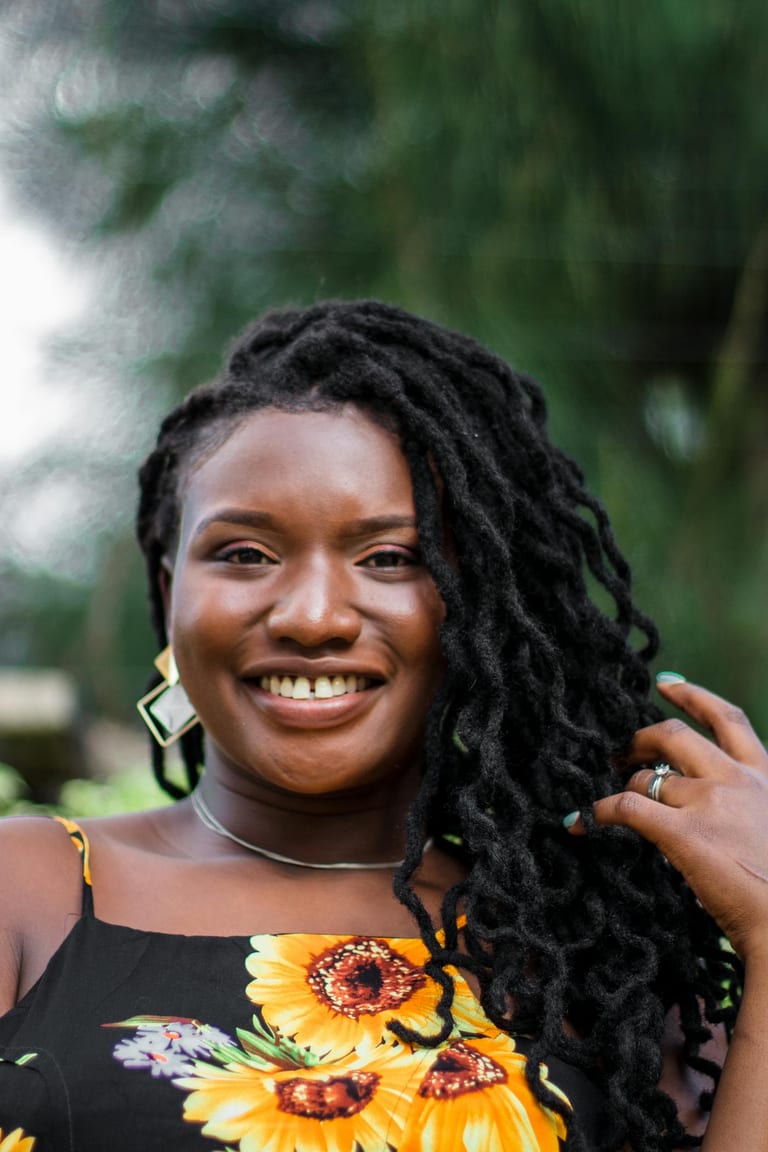 Smiling client after a fresh retwist